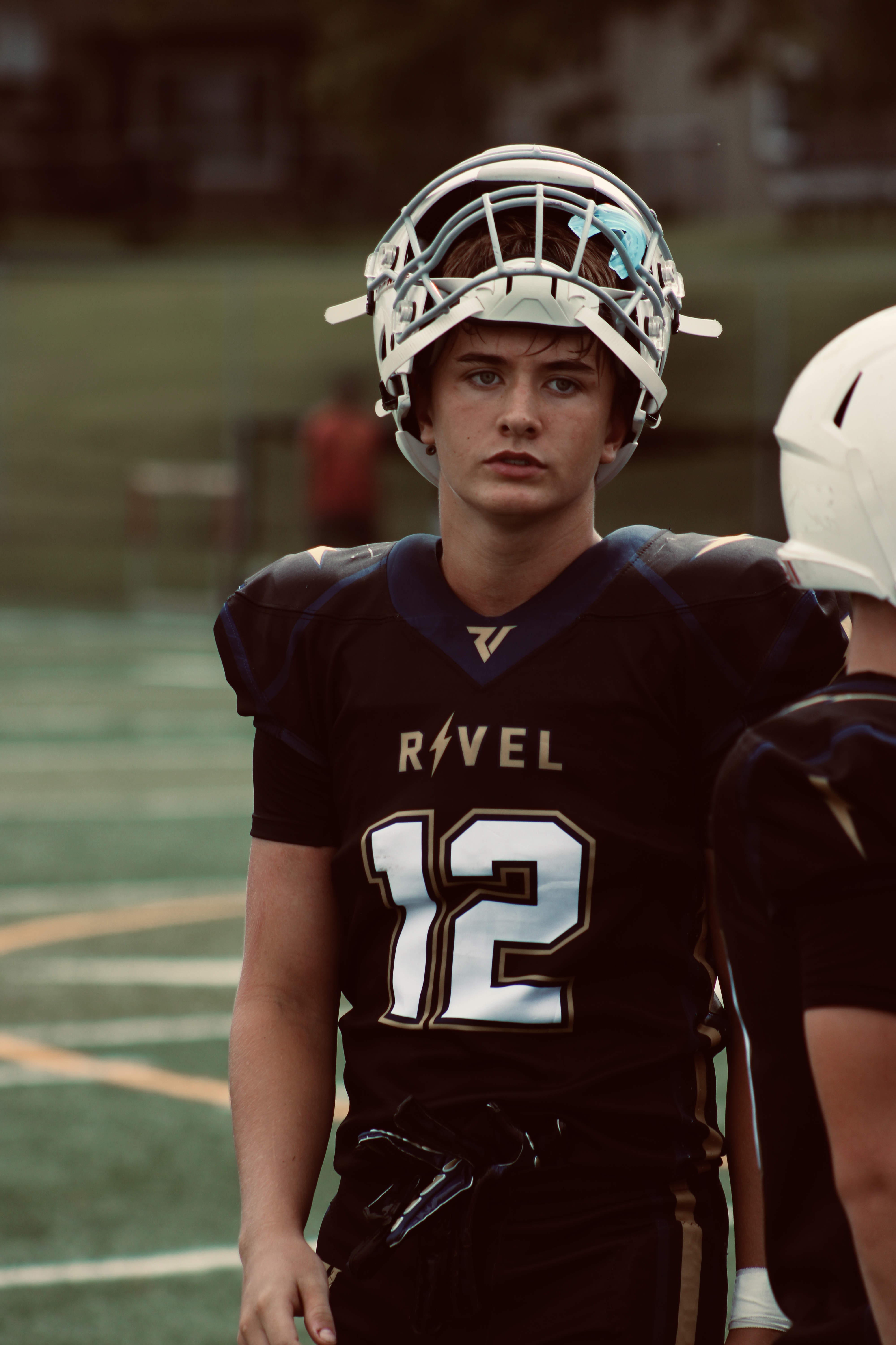 Evan Dellwo in football helmet and uniform