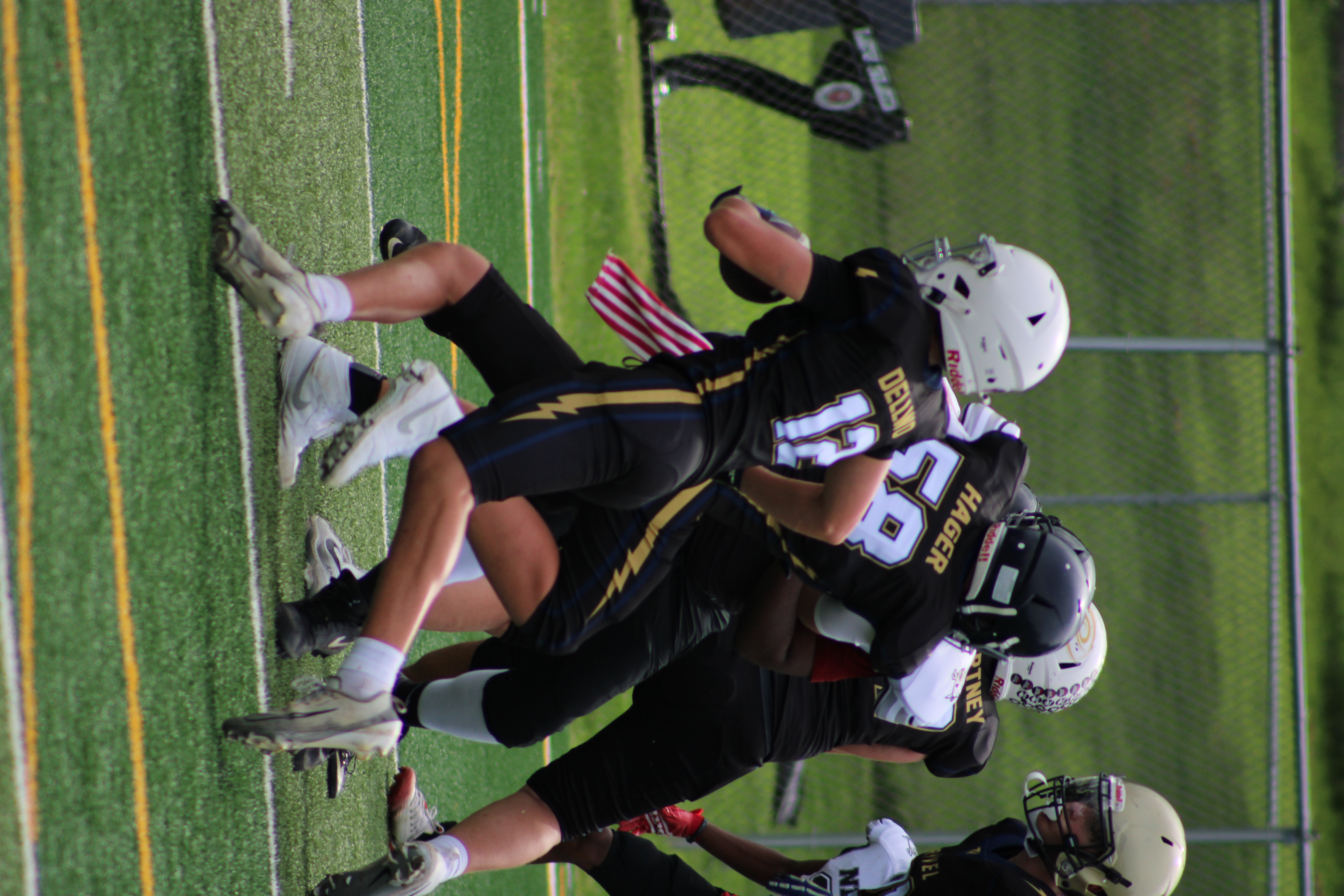 Evan Dellwo carrying the football during a game
